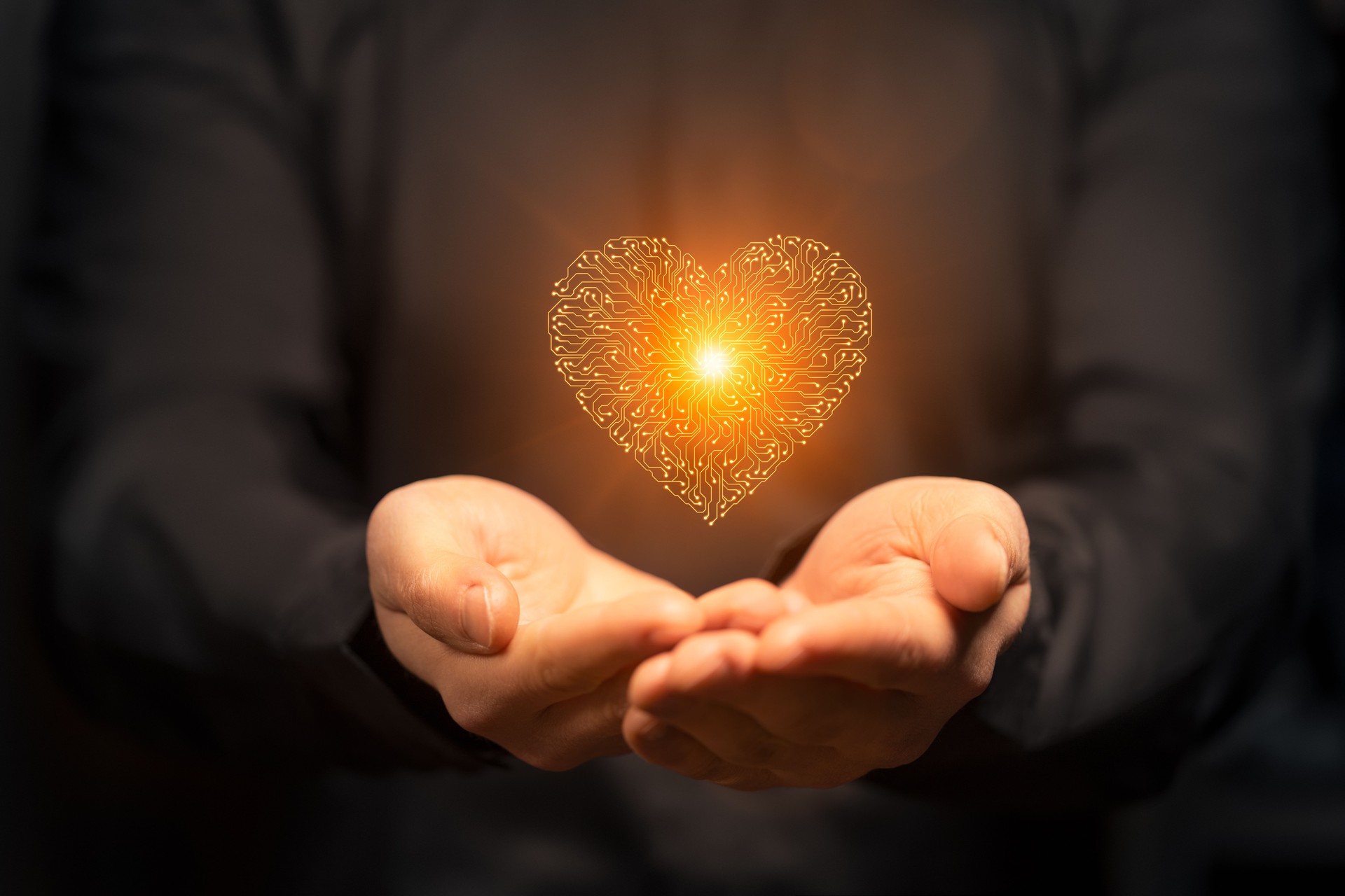 Intelligenza artificiale Circuito stampato simbolo del cuore nelle mani degli uomini